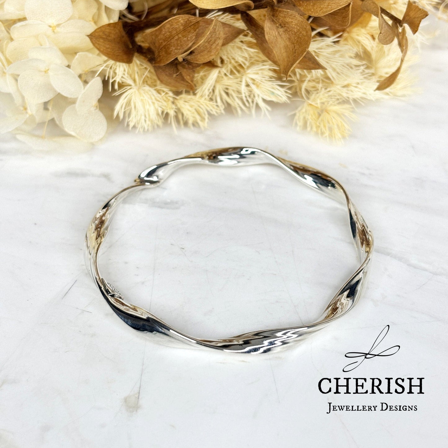 Round Twisted Bangle