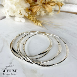 5 Loose Round Uneven Sterling Silver Bangles