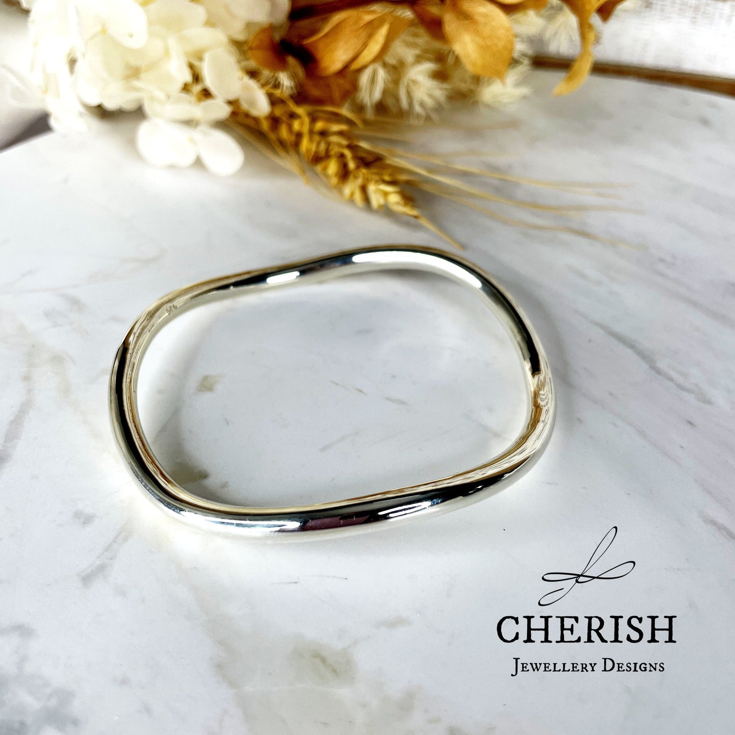 Sterling Silver Waved Tubed Bangle