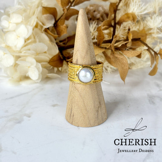 Round Pearl Ring with Intricate Band in Gold