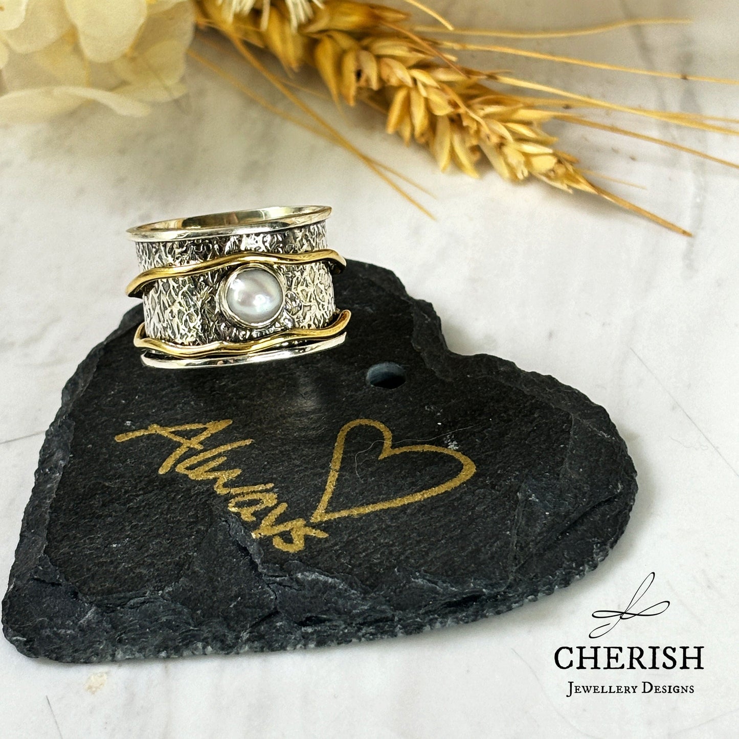 Ram Pearl Spinner Ring